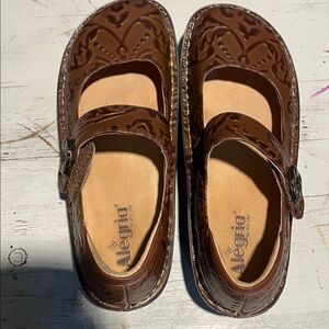 Alegria Brown Patent Mary Jane Flats with Embossed Detail